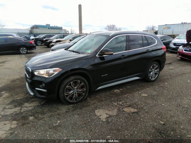 Photo 5 VIN: WBXHT3Z38H4A57923 - BMW X1 