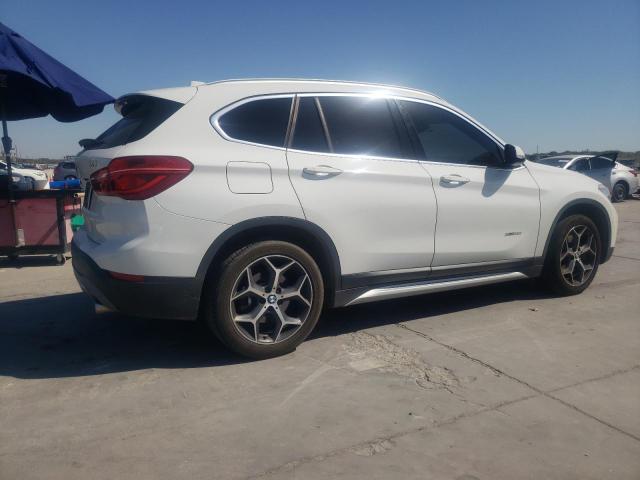 Photo 2 VIN: WBXHT3Z38J4A66093 - BMW X1 XDRIVE2 