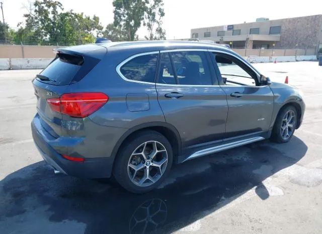 Photo 3 VIN: WBXHT3Z39G4A50140 - BMW X1 