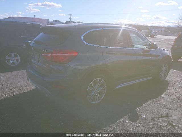 Photo 3 VIN: WBXHT3Z39G4A50414 - BMW X1 