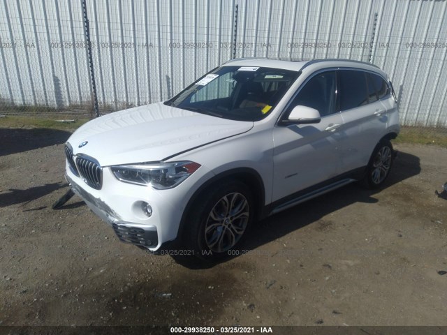 Photo 1 VIN: WBXHT3Z39G4A51482 - BMW X1 