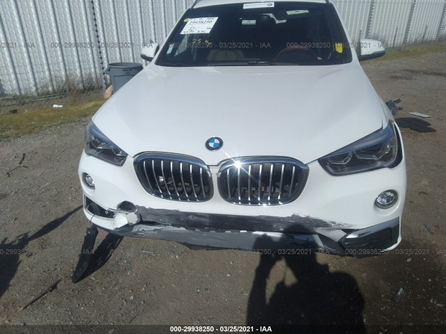 Photo 5 VIN: WBXHT3Z39G4A51482 - BMW X1 