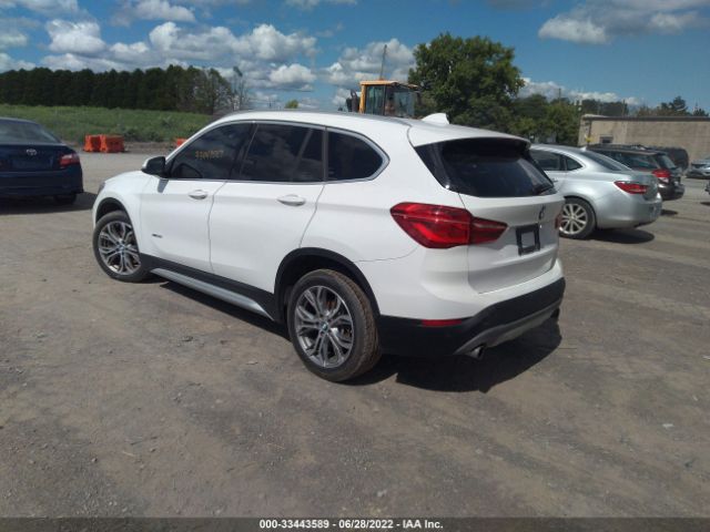 Photo 2 VIN: WBXHT3Z39H4A52293 - BMW X1 