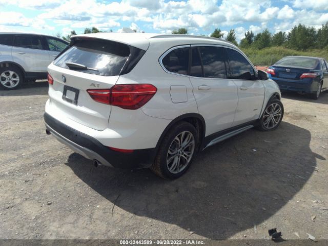 Photo 3 VIN: WBXHT3Z39H4A52293 - BMW X1 