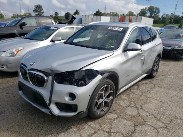 Photo 1 VIN: WBXHT3Z39H4A57218 - BMW X1 