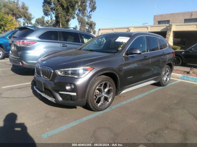 Photo 1 VIN: WBXHT3Z3XG4A47568 - BMW X1 