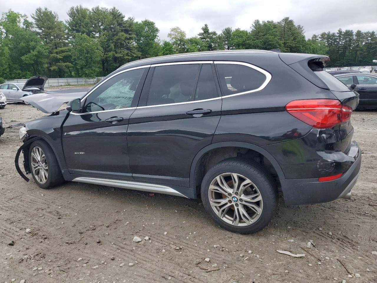 Photo 1 VIN: WBXHT3Z3XG4A50325 - BMW X1 