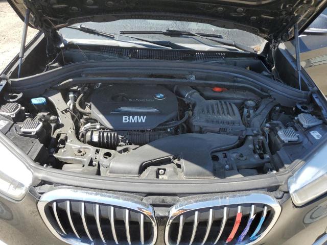 Photo 11 VIN: WBXHT3Z3XH4A55171 - BMW X1 