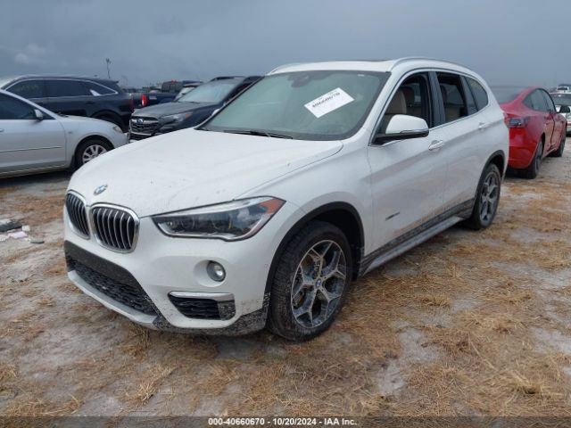 Photo 1 VIN: WBXHT3Z3XH4A57180 - BMW X1 