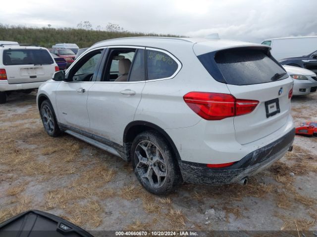 Photo 2 VIN: WBXHT3Z3XH4A57180 - BMW X1 