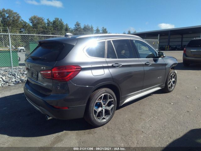 Photo 3 VIN: WBXHT3Z3XJ4A66144 - BMW X1 