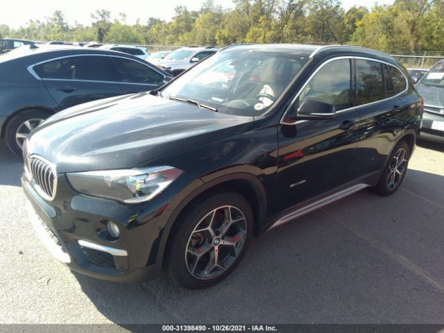 Photo 1 VIN: WBXHU7C30H5H33854 - BMW X1 