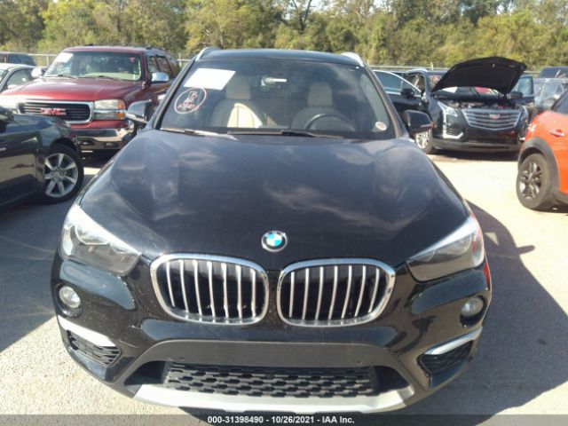 Photo 5 VIN: WBXHU7C30H5H33854 - BMW X1 