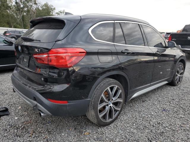 Photo 2 VIN: WBXHU7C30H5H35667 - BMW X1 