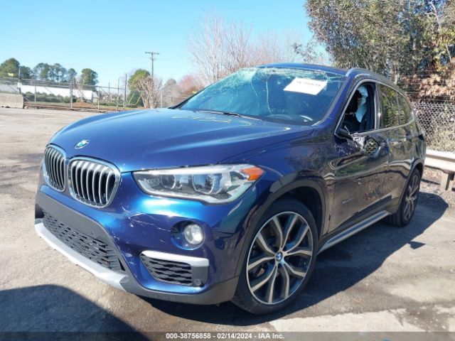 Photo 1 VIN: WBXHU7C30H5H36432 - BMW X1 