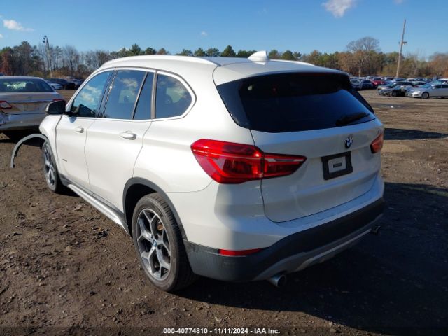 Photo 2 VIN: WBXHU7C30J5H42057 - BMW X1 