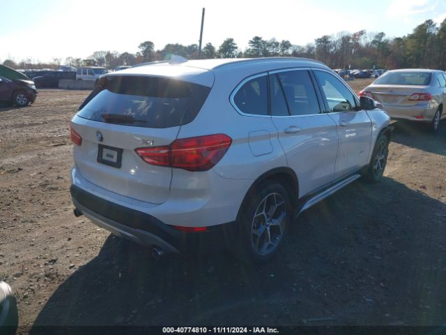 Photo 3 VIN: WBXHU7C30J5H42057 - BMW X1 