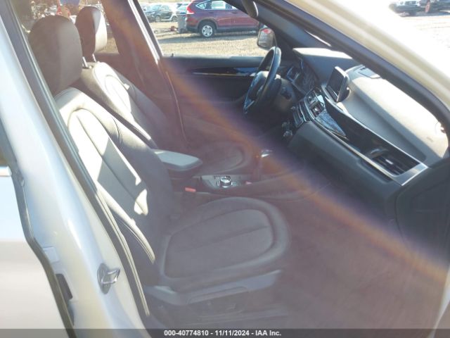 Photo 4 VIN: WBXHU7C30J5H42057 - BMW X1 