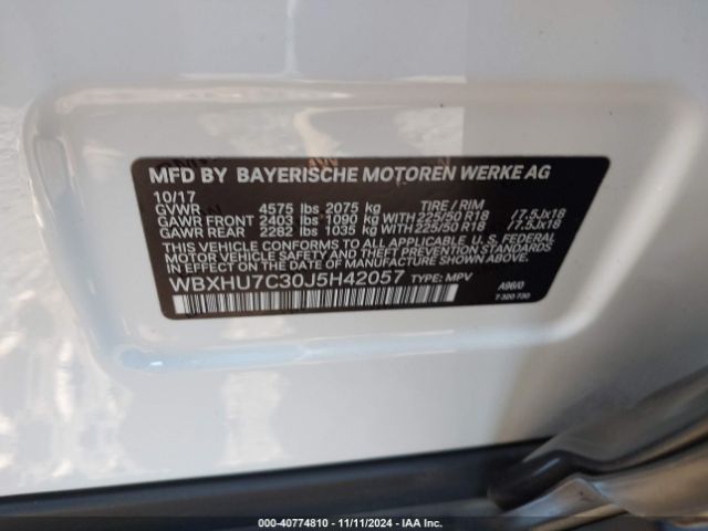 Photo 8 VIN: WBXHU7C30J5H42057 - BMW X1 