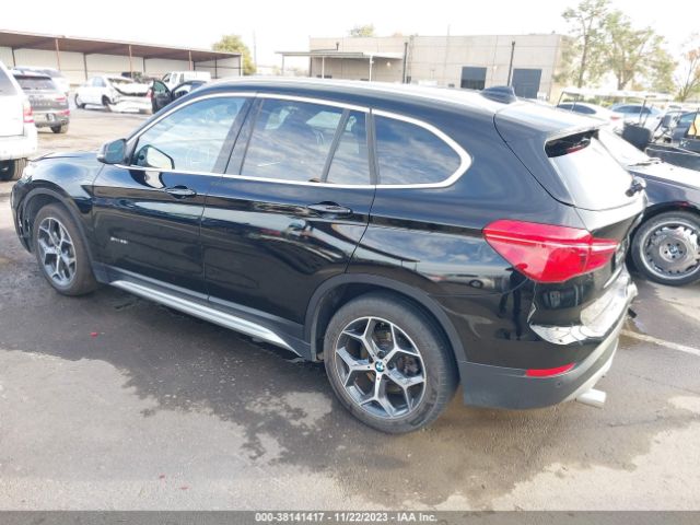 Photo 2 VIN: WBXHU7C30J5H43466 - BMW X1 