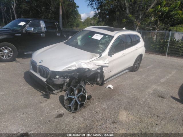 Photo 1 VIN: WBXHU7C30J5L05687 - BMW X1 