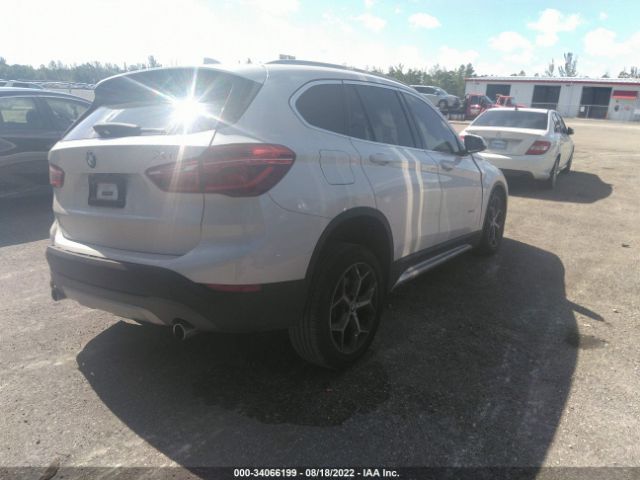 Photo 3 VIN: WBXHU7C30J5L05687 - BMW X1 