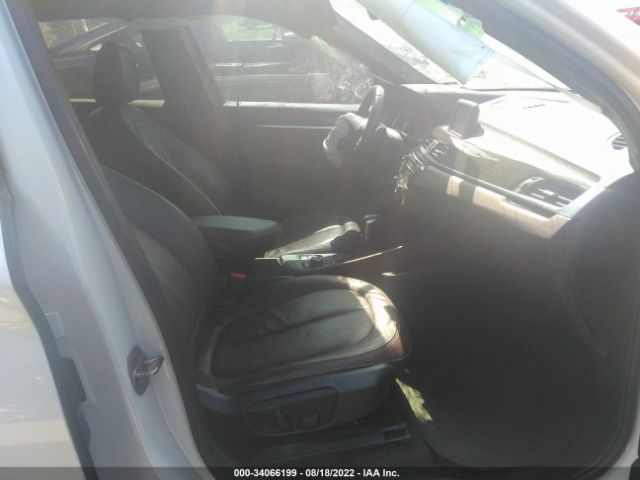 Photo 4 VIN: WBXHU7C30J5L05687 - BMW X1 