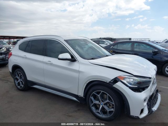 Photo 0 VIN: WBXHU7C30J5L06094 - BMW X1 