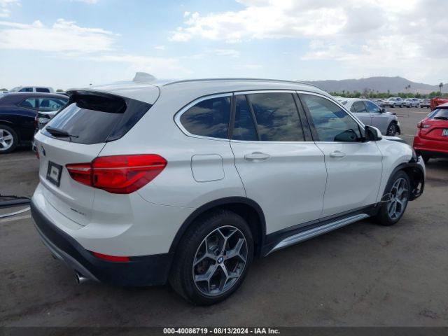 Photo 3 VIN: WBXHU7C30J5L06094 - BMW X1 