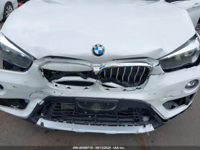 Photo 5 VIN: WBXHU7C30J5L06094 - BMW X1 