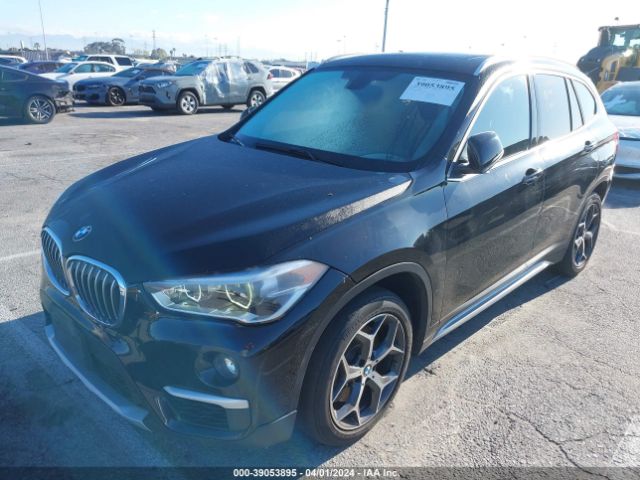 Photo 1 VIN: WBXHU7C30J5L06547 - BMW X1 