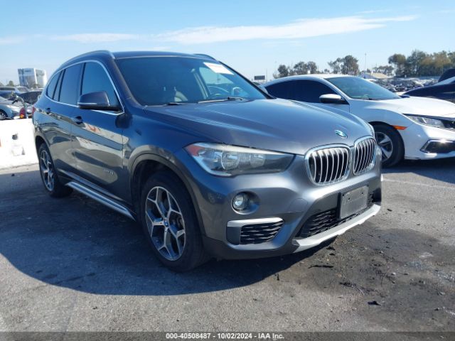 Photo 0 VIN: WBXHU7C31H5H34446 - BMW X1 