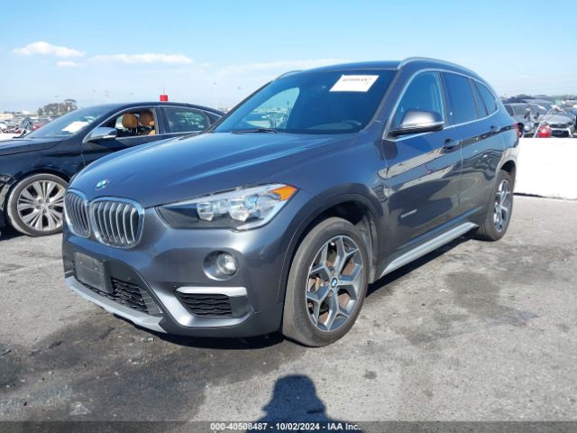 Photo 1 VIN: WBXHU7C31H5H34446 - BMW X1 