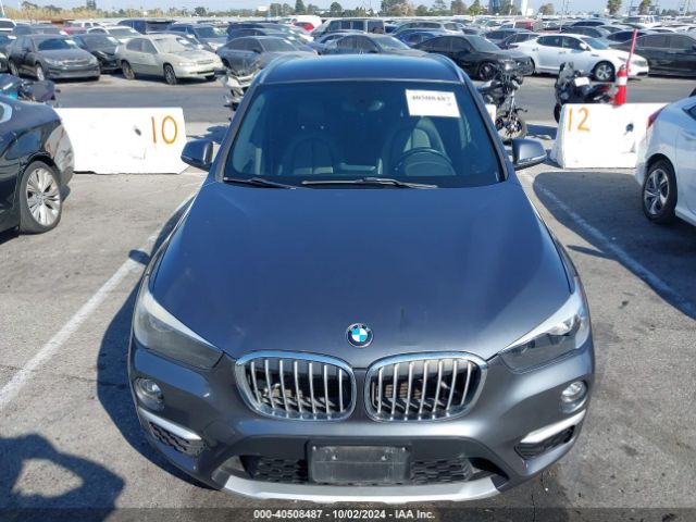 Photo 5 VIN: WBXHU7C31H5H34446 - BMW X1 