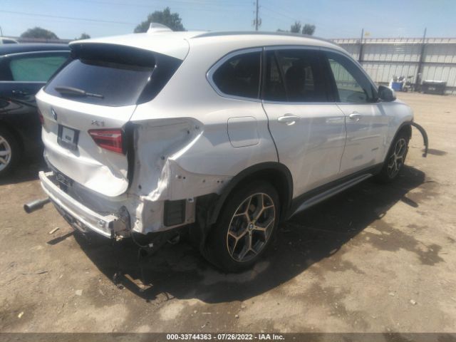 Photo 3 VIN: WBXHU7C31H5H34575 - BMW X1 