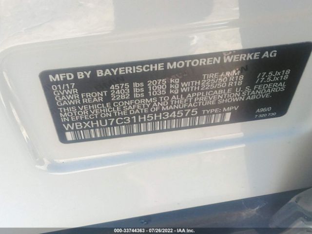 Photo 8 VIN: WBXHU7C31H5H34575 - BMW X1 