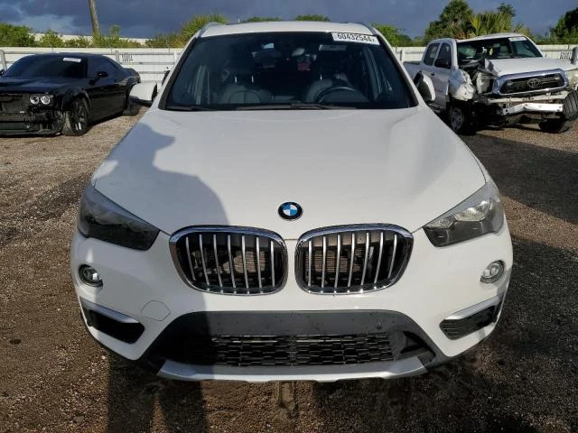 Photo 4 VIN: WBXHU7C31H5H35774 - BMW X1 SDRIVE2 