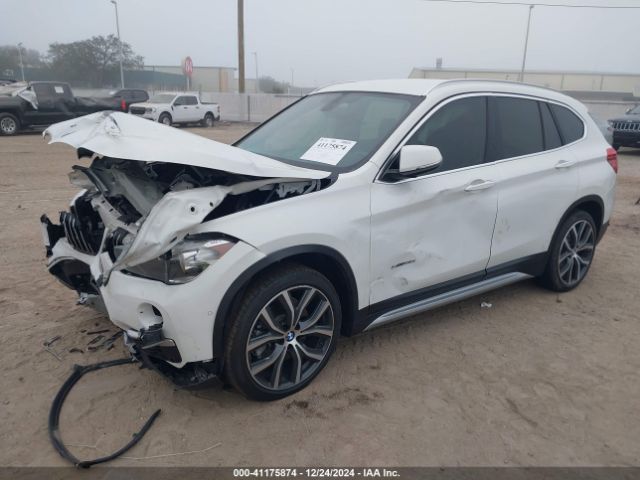 Photo 1 VIN: WBXHU7C31H5H36441 - BMW X1 