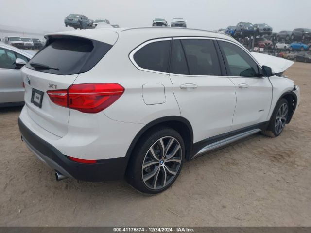 Photo 3 VIN: WBXHU7C31H5H36441 - BMW X1 