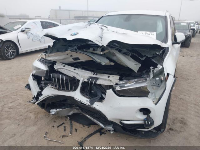 Photo 5 VIN: WBXHU7C31H5H36441 - BMW X1 