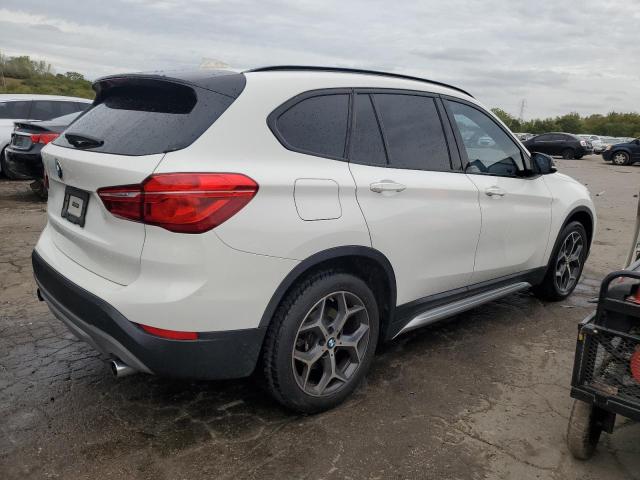 Photo 2 VIN: WBXHU7C31H5H37749 - BMW X1 SDRIVE2 