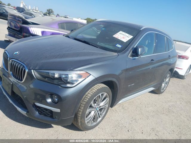 Photo 1 VIN: WBXHU7C31HP925415 - BMW X1 