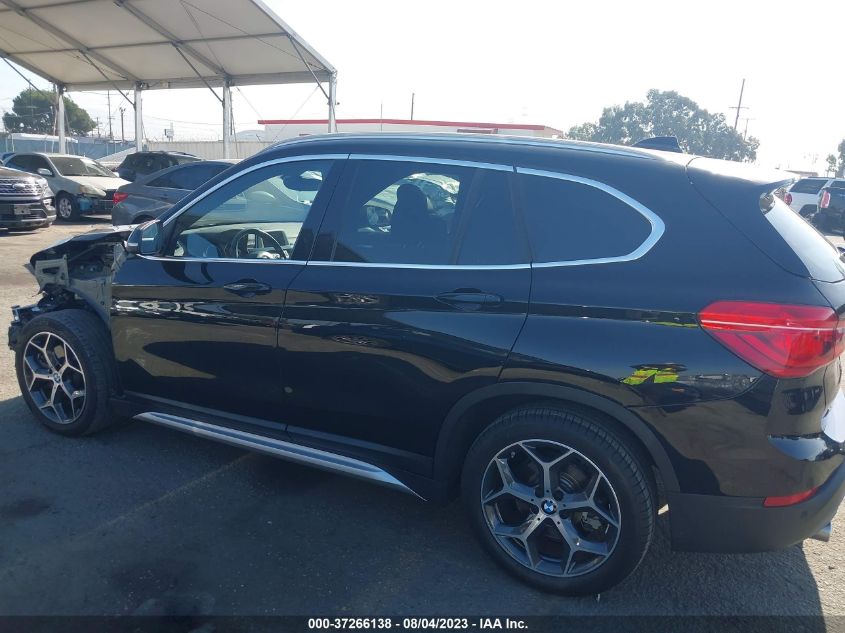 Photo 14 VIN: WBXHU7C31J3H43441 - BMW X1 