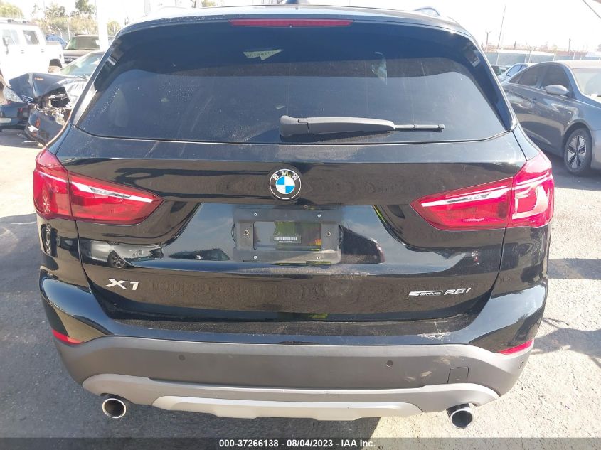 Photo 16 VIN: WBXHU7C31J3H43441 - BMW X1 