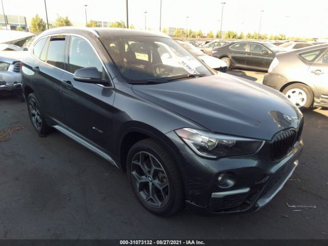 Photo 0 VIN: WBXHU7C31J5H40186 - BMW X1 