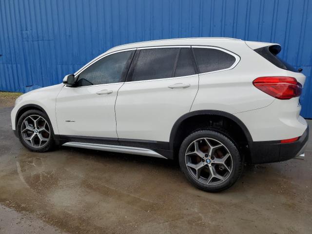 Photo 1 VIN: WBXHU7C31J5H43010 - BMW X1 