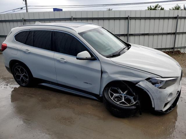 Photo 3 VIN: WBXHU7C31J5H43010 - BMW X1 