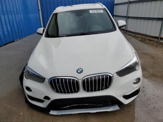 Photo 4 VIN: WBXHU7C31J5H43010 - BMW X1 