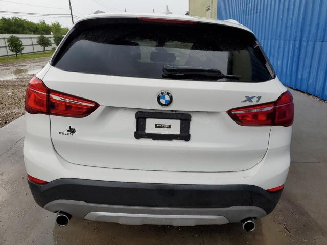 Photo 5 VIN: WBXHU7C31J5H43010 - BMW X1 