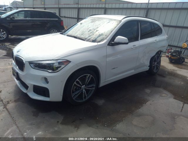 Photo 1 VIN: WBXHU7C31J5L05195 - BMW X1 